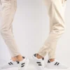 کفش ورزشی کتانی سبک انعطاف پذیر ارتوپدی تضمینی Unisex سفید مشکی - 537