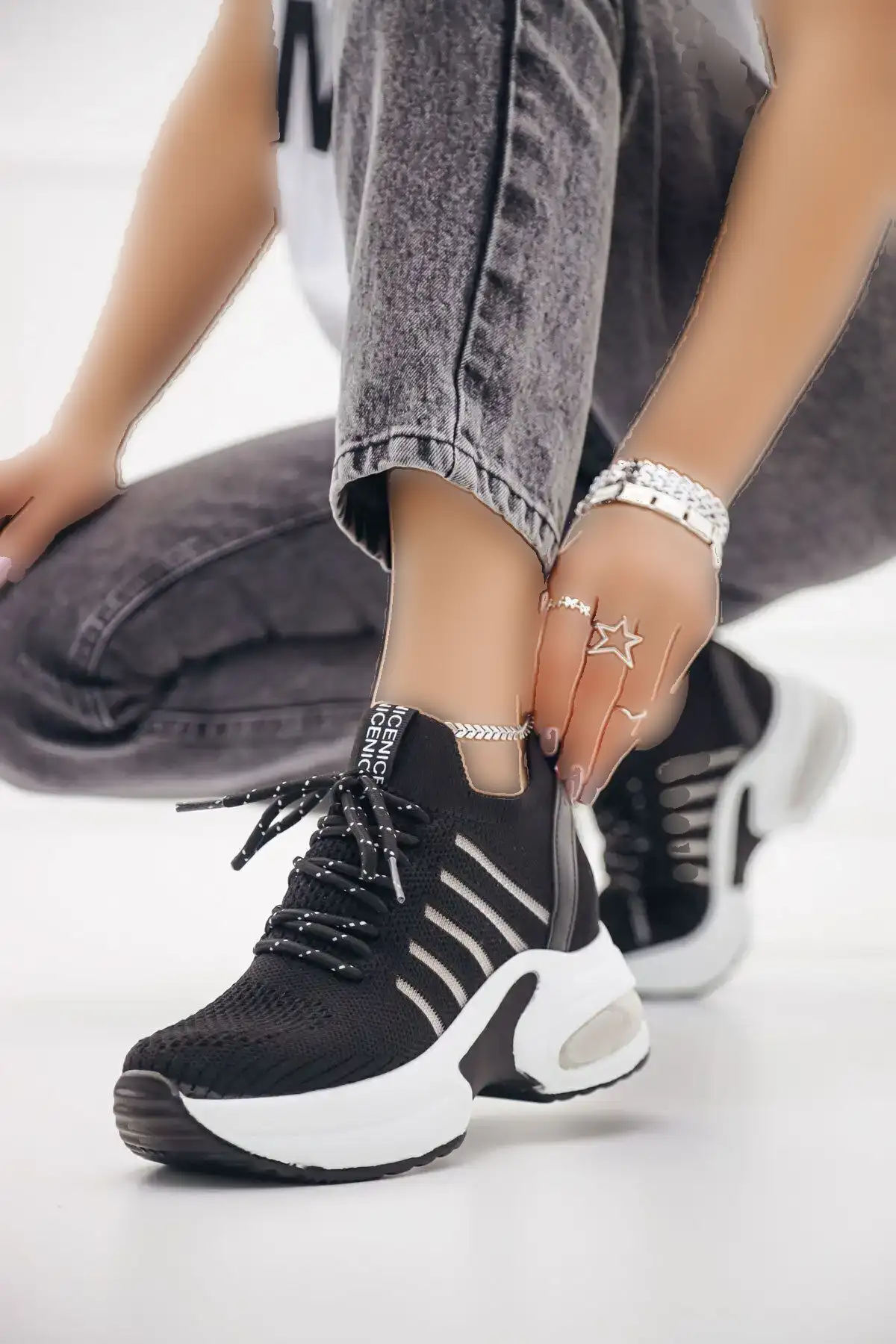 کفش کتانی اسپرت زنانه کشباف مشکی پاشنه مخفی Dansel - 345 کفش کتانی اسپرت زنانه کشباف مشکی پاشنه مخفی Dansel - 345