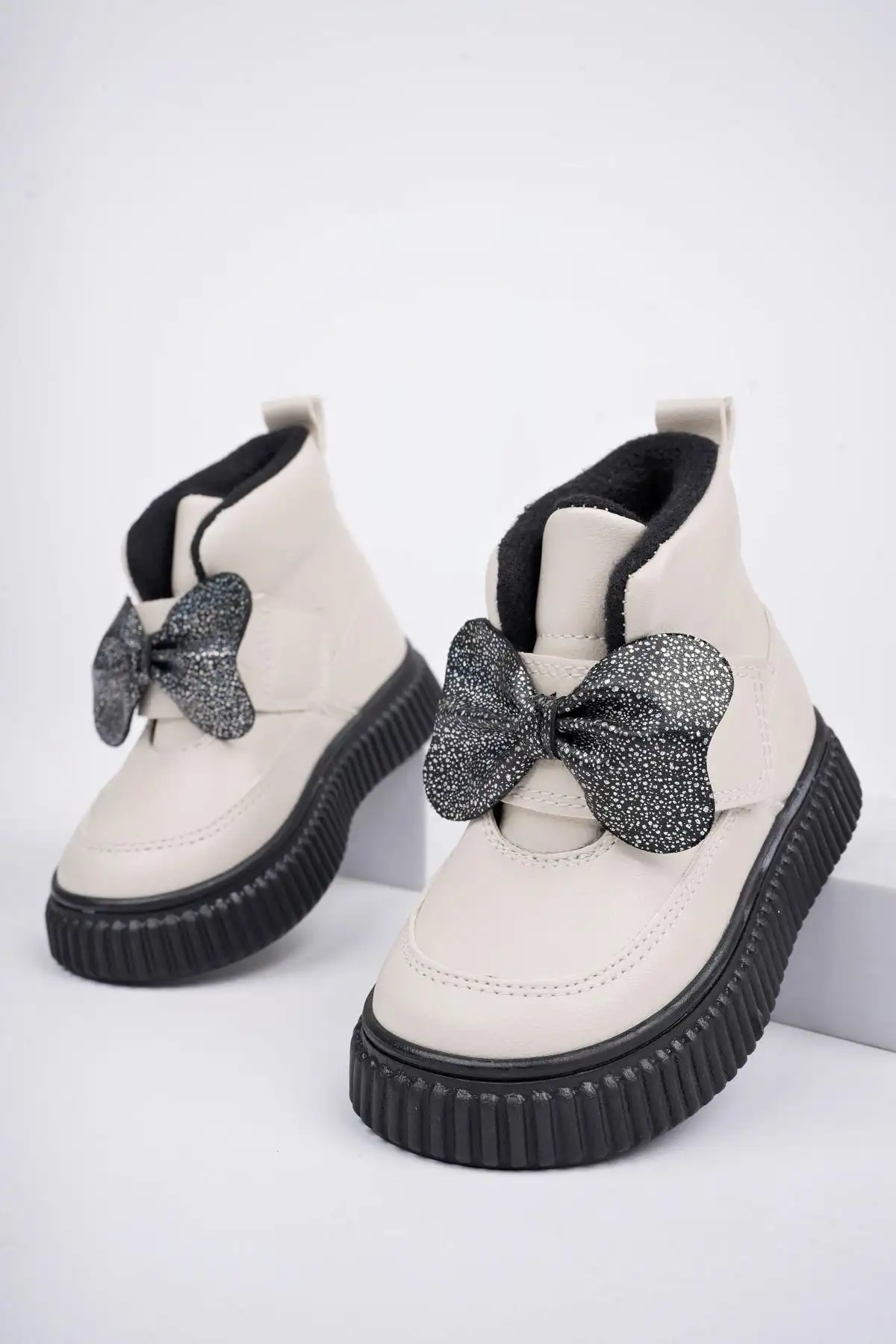 چکمه های زمستانی بچه گانه پاپیون و چسب دار با کفی بدون لغزش تضمینی Nixie - 204 چکمه های زمستانی بچه گانه پاپیون و چسب دار با کفی بدون لغزش تضمینی Nixie - 204