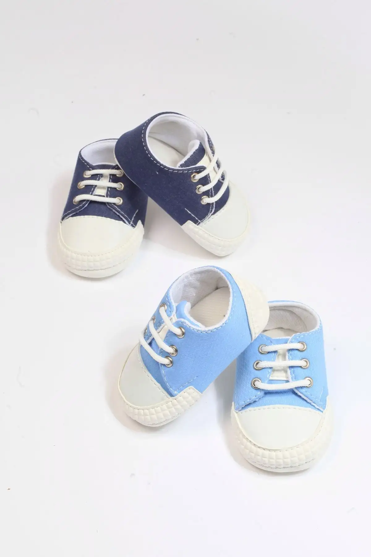 کفش نوزاد پسر 2 جفت پاپوش نوزادی مدل کنورس با بند در رنگهای سرمهای و آبی - 3297 کفش نوزاد پسر 2 جفت پاپوش نوزادی مدل کنورس با بند در رنگهای سرمهای و آبی - 3297