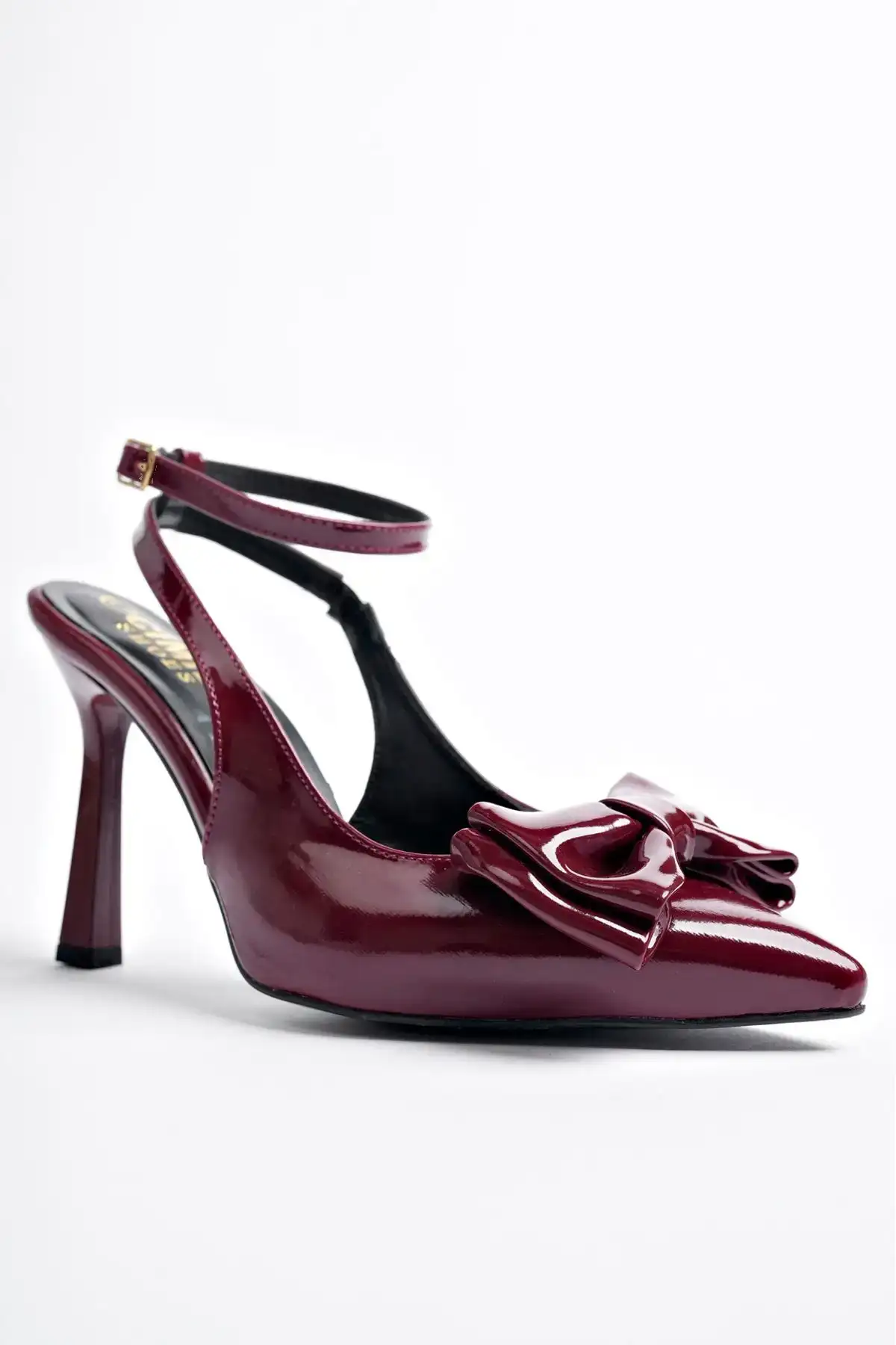 کفش پاشنه بلند زنانه کفش پاشنهبلند زنانه با جزئیات پاپیونی و بند مچ، ساخته شده از چرم براق و نوکتیز - 3686 کفش پاشنه بلند زنانه کفش پاشنهبلند زنانه با جزئیات پاپیونی و بند مچ، ساخته شده از چرم براق و نوکتیز - 3686