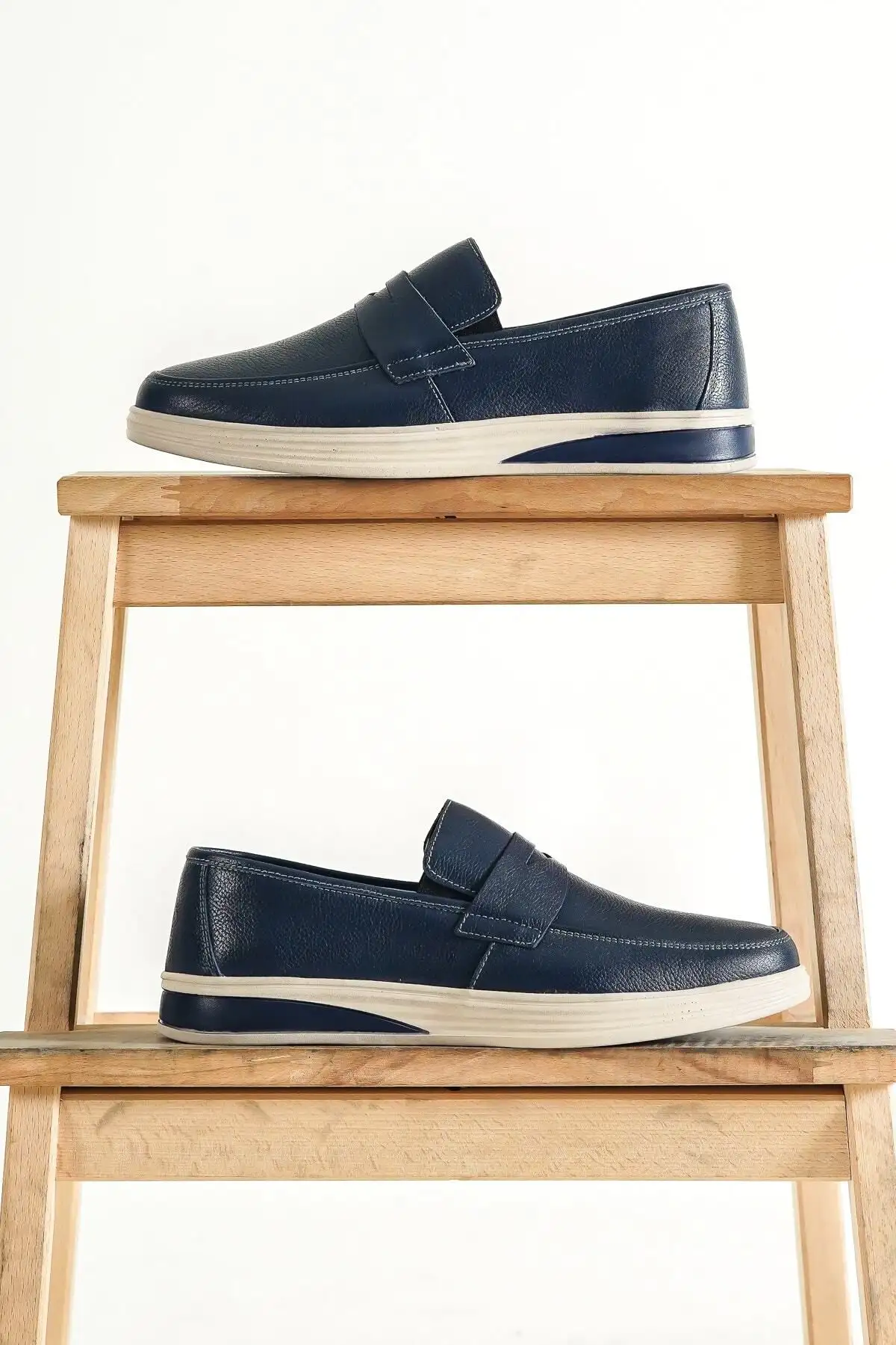 کفش روزمره مردانه  کج  چرمی آبی تیره اصل MRD7-0710 - 4659 کفش روزمره مردانه کج چرمی آبی تیره اصل MRD7-0710 - 4659