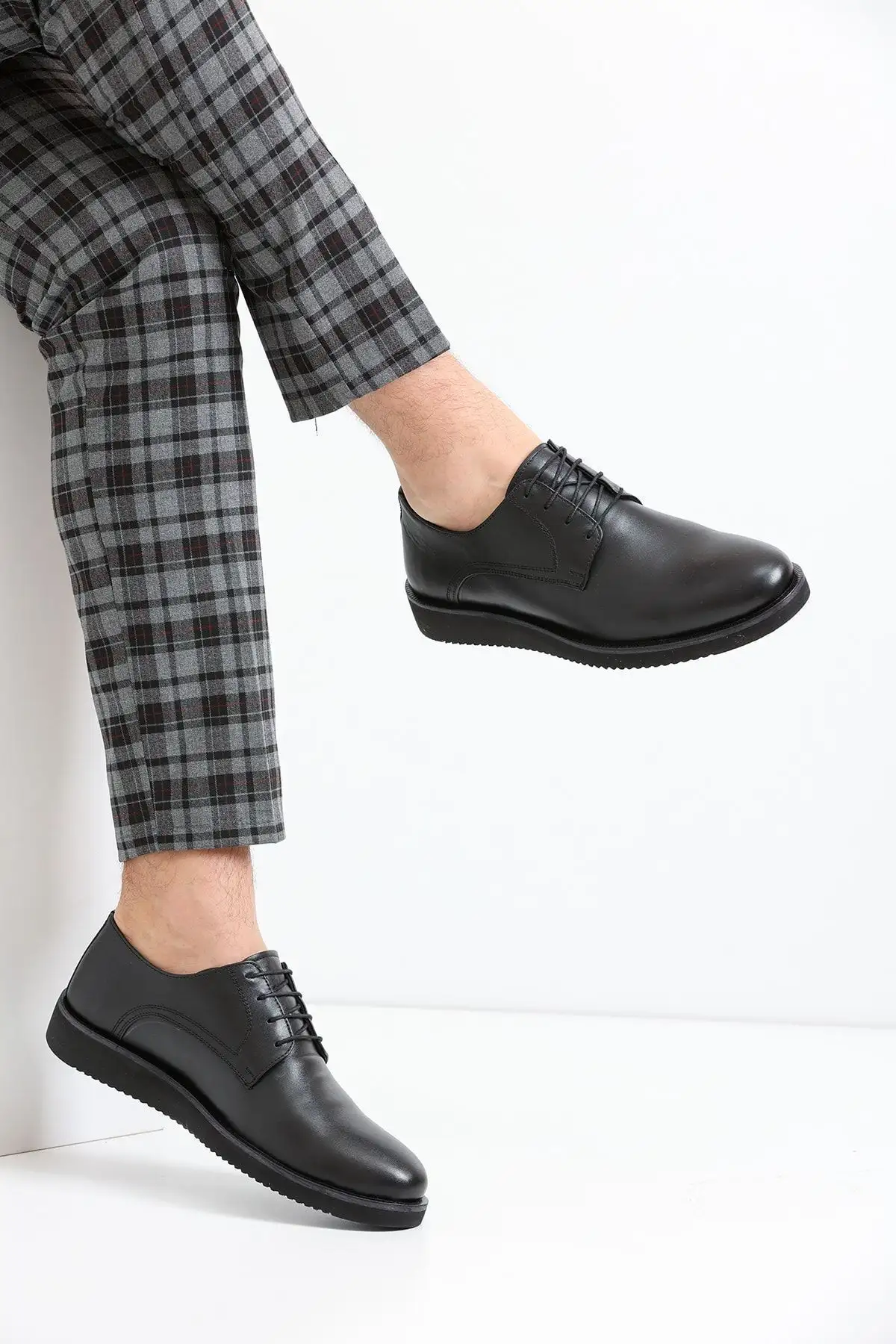 کفش روزمره مردانه   چرمی واقعی سیاه EVA مدل HK1548 - 6061 کفش روزمره مردانه چرمی واقعی سیاه EVA مدل HK1548 - 6061