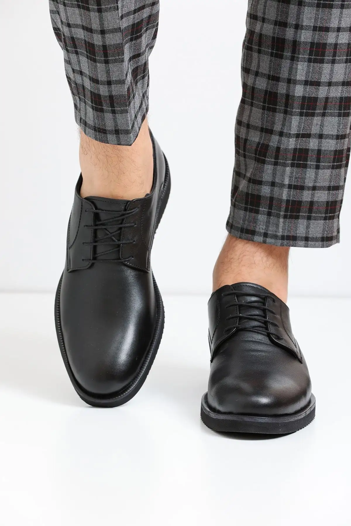 کفش روزمره مردانه   چرمی واقعی سیاه EVA مدل HK1548 - 6061 کفش روزمره مردانه چرمی واقعی سیاه EVA مدل HK1548 - 6061