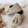کفش نوزاد پسر آکسل کِرِم مَکوزن بچه‌گانه از چرم طبیعی - 5473