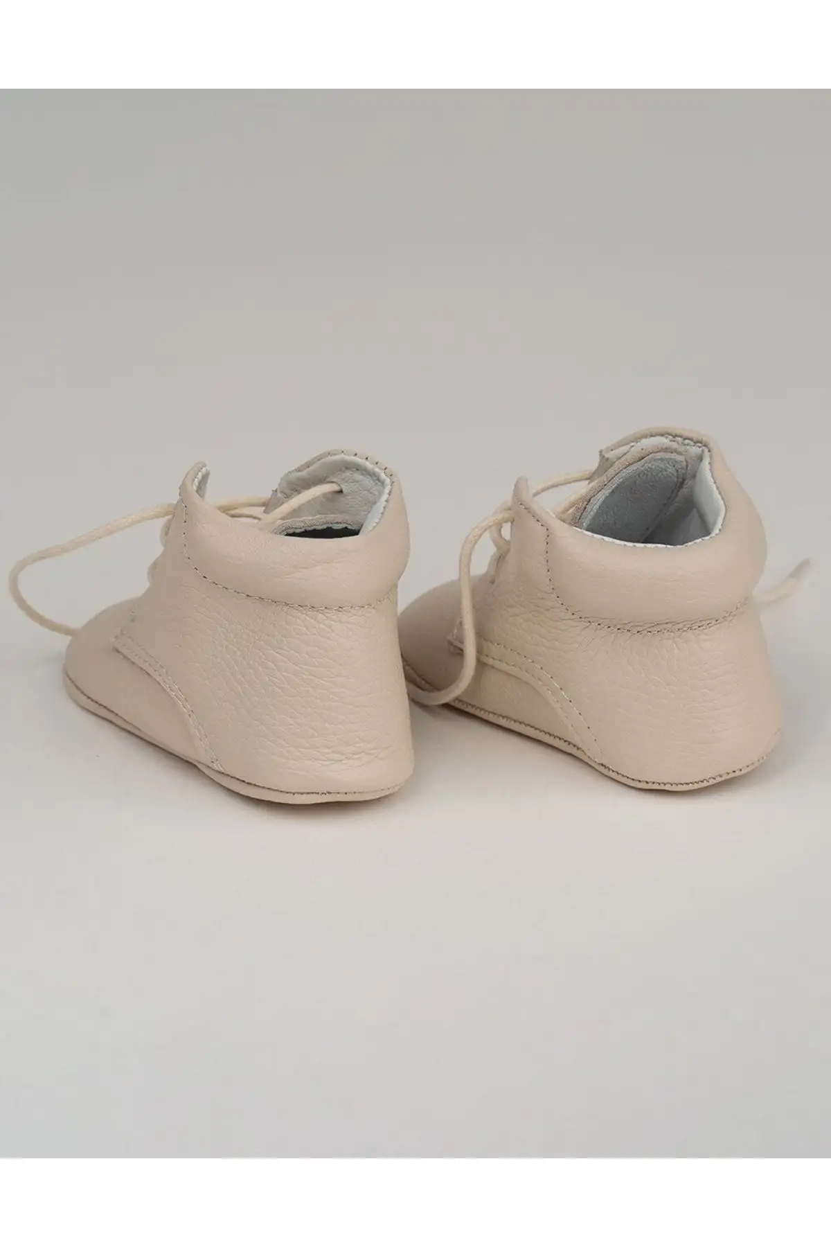 کفش نوزاد پسر بوت ی چرمی با بند لئو - رنگ کرم - 7149 کفش نوزاد پسر بوت ی چرمی با بند لئو - رنگ کرم - 7149