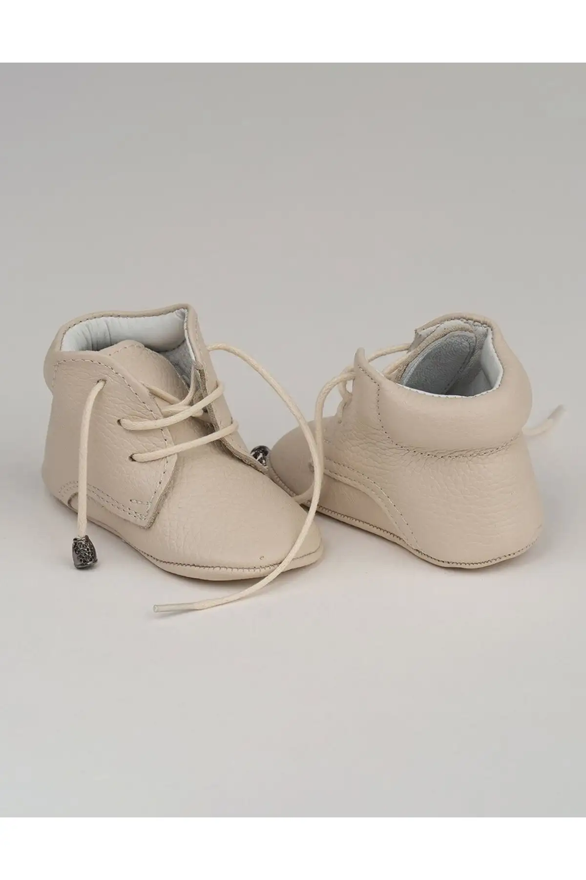 کفش نوزاد پسر بوت ی چرمی با بند لئو - رنگ کرم - 7149 کفش نوزاد پسر بوت ی چرمی با بند لئو - رنگ کرم - 7149