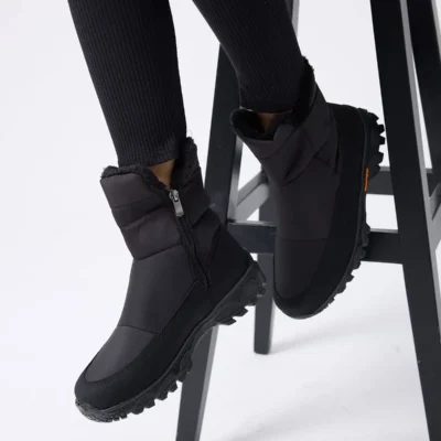 کفش مجلسی زنانه بوت جدید مدل مشکی با زیپ، دارای کفی ارتوپدیک، ضد لغزش و ضد آب با راحتی انعطاف‌پذیر. - 5680