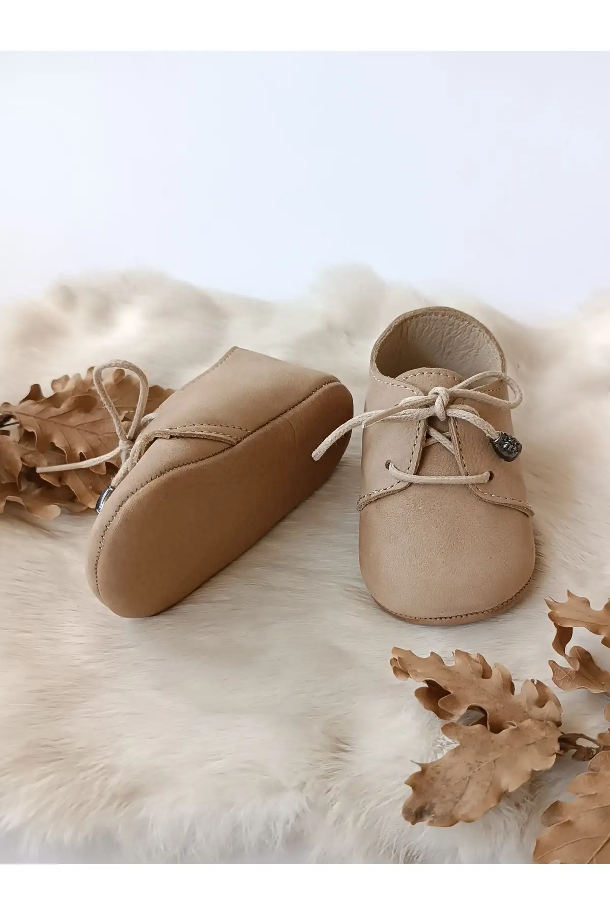 کفش نوزاد پسر  مکوسن ی آلفا با چرم طبیعی و قهوه شیری - 5452 کفش نوزاد پسر مکوسن ی آلفا با چرم طبیعی و قهوه شیری - 5452