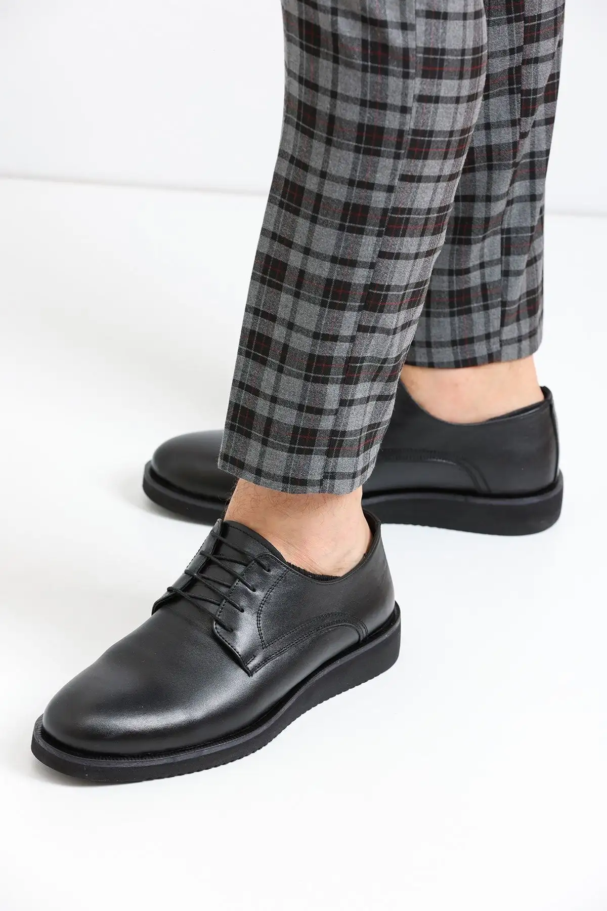 کفش روزمره مردانه   چرمی واقعی سیاه EVA مدل HK1548 - 6061 کفش روزمره مردانه چرمی واقعی سیاه EVA مدل HK1548 - 6061