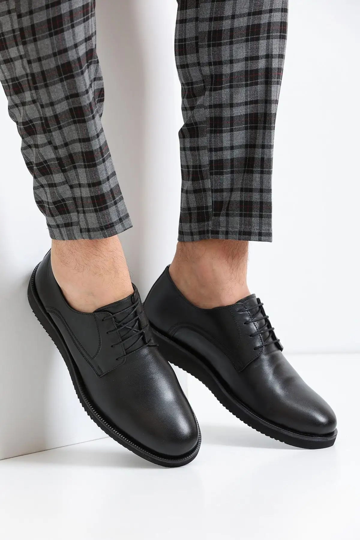 کفش روزمره مردانه   چرمی واقعی سیاه EVA مدل HK1548 - 6061 کفش روزمره مردانه چرمی واقعی سیاه EVA مدل HK1548 - 6061