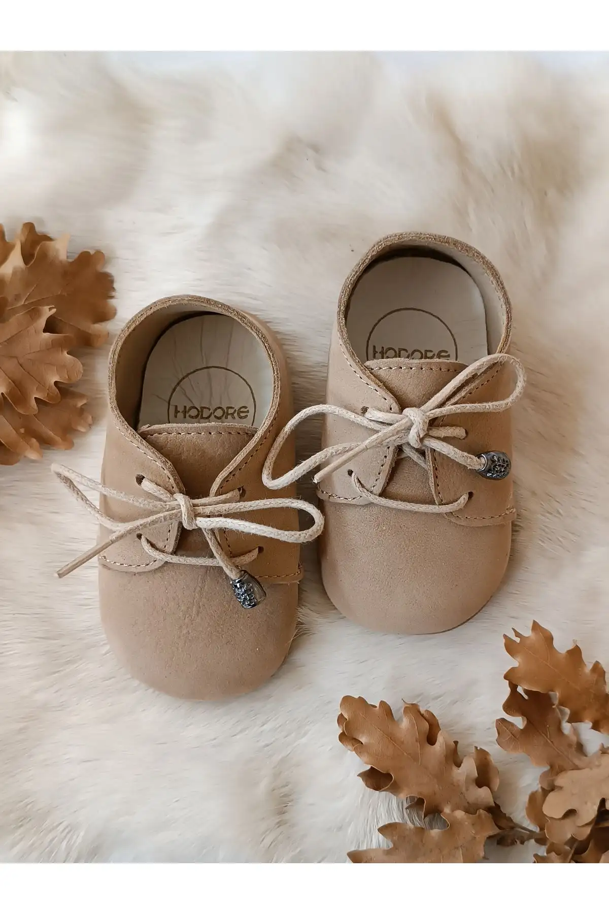 کفش نوزاد پسر  مکوسن ی آلفا با چرم طبیعی و قهوه شیری - 5452 کفش نوزاد پسر مکوسن ی آلفا با چرم طبیعی و قهوه شیری - 5452