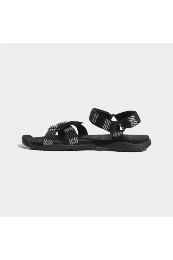 کفش صندل زنانه محصول "MOARY" به رنگ‌های مشکی، نقره‌ای سبز و طلایی فعال است. برند adidas - 7418