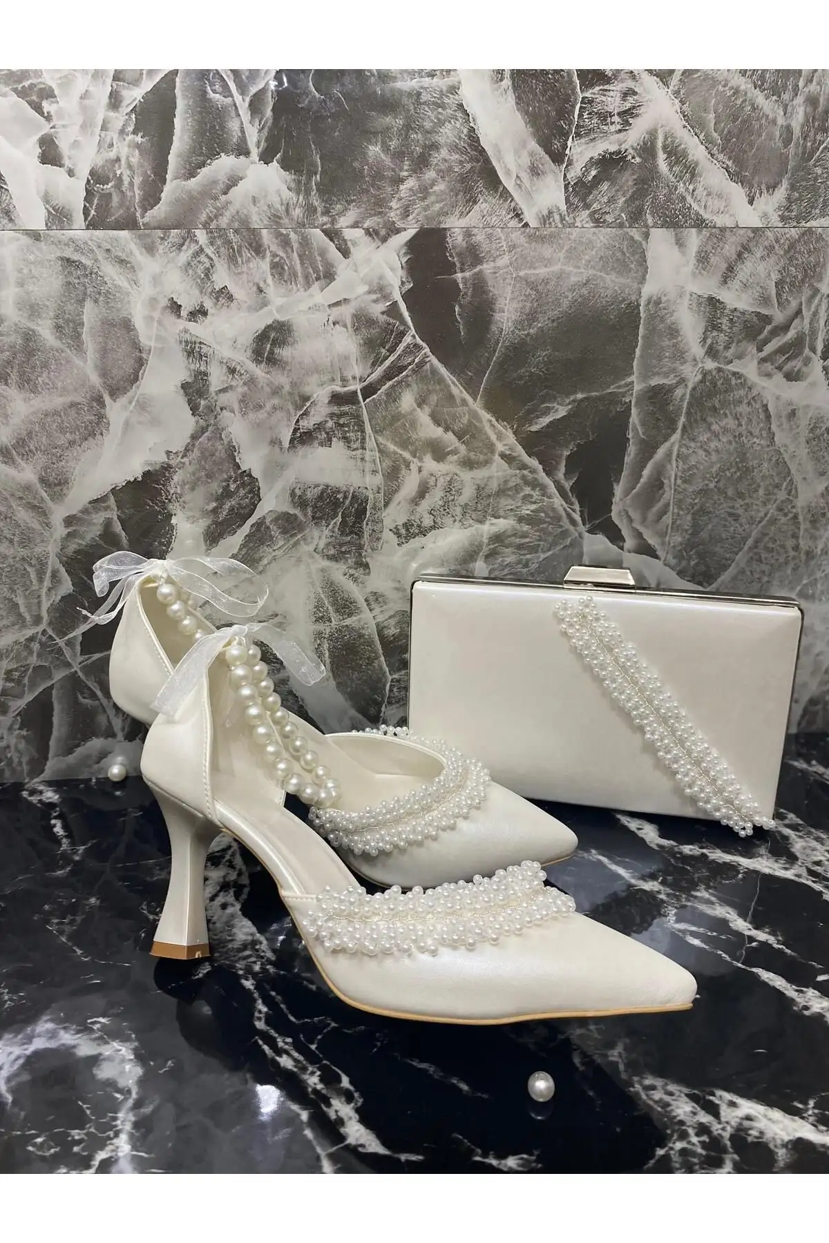 کفش پاشنه بلند زنانه  و کیف مجلسی  به همراه مروارید به طول 7 سانتیمتر - 7248 کفش پاشنه بلند زنانه و کیف مجلسی به همراه مروارید به طول 7 سانتیمتر - 7248