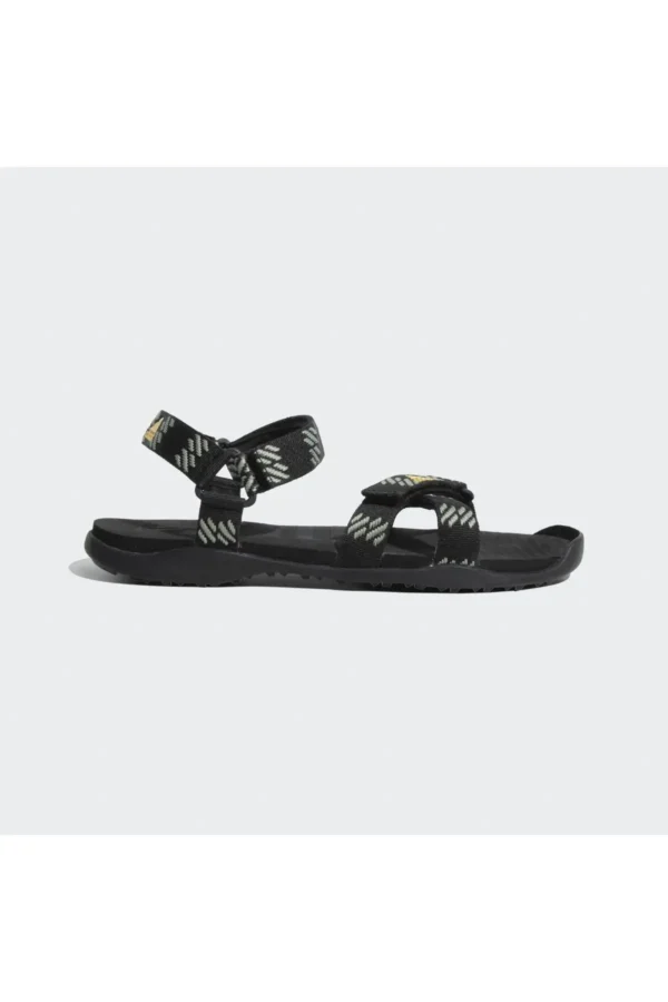 کفش صندل زنانه محصول "MOARY" به رنگ‌های مشکی، نقره‌ای سبز و طلایی فعال است. برند adidas - 7418
