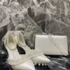 کفش پاشنه‌ بلند زنانه و کیف مجلسی به همراه مروارید به طول 7 سانتی‌متر - 7248