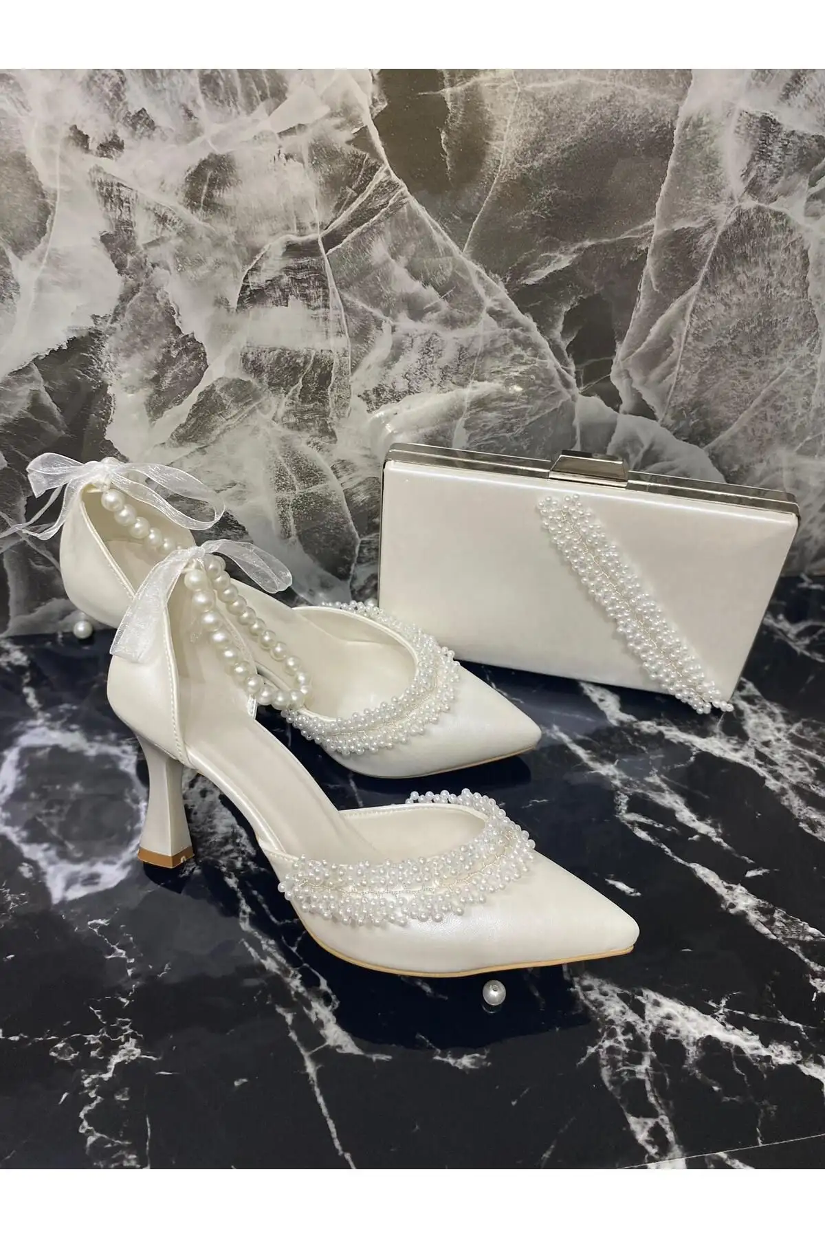 کفش پاشنه بلند زنانه  و کیف مجلسی  به همراه مروارید به طول 7 سانتیمتر - 7248 کفش پاشنه بلند زنانه و کیف مجلسی به همراه مروارید به طول 7 سانتیمتر - 7248