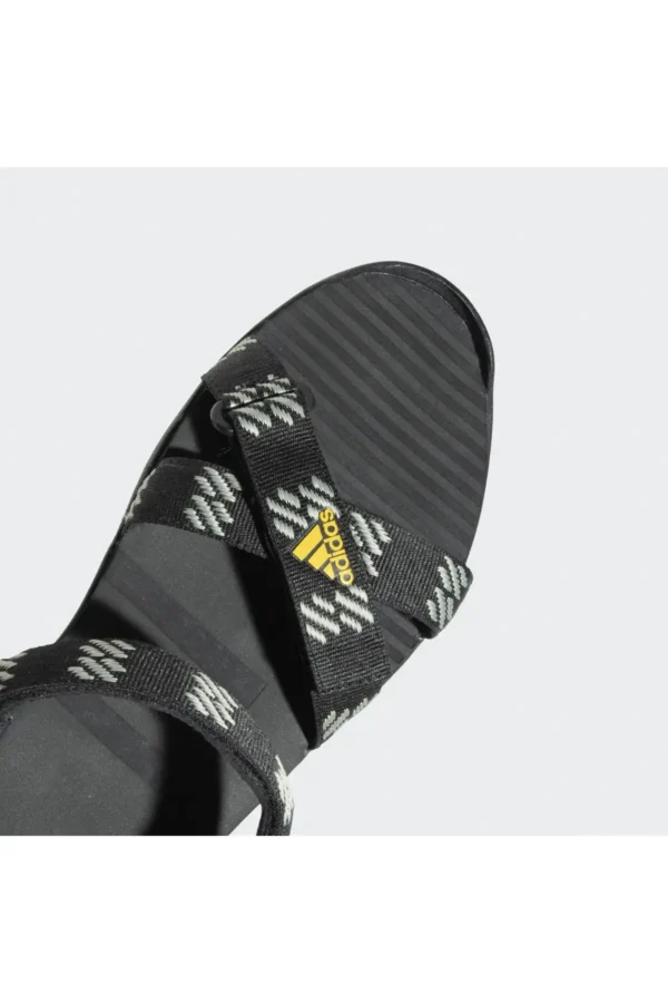 کفش صندل زنانه محصول "MOARY" به رنگ‌های مشکی، نقره‌ای سبز و طلایی فعال است. برند adidas - 7418