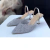 کفش پاشنه‌ بلند زنانه دار نقره‌ای با سنگ شیشه‌ای 6 سانتی‌متری 01210 - 7234