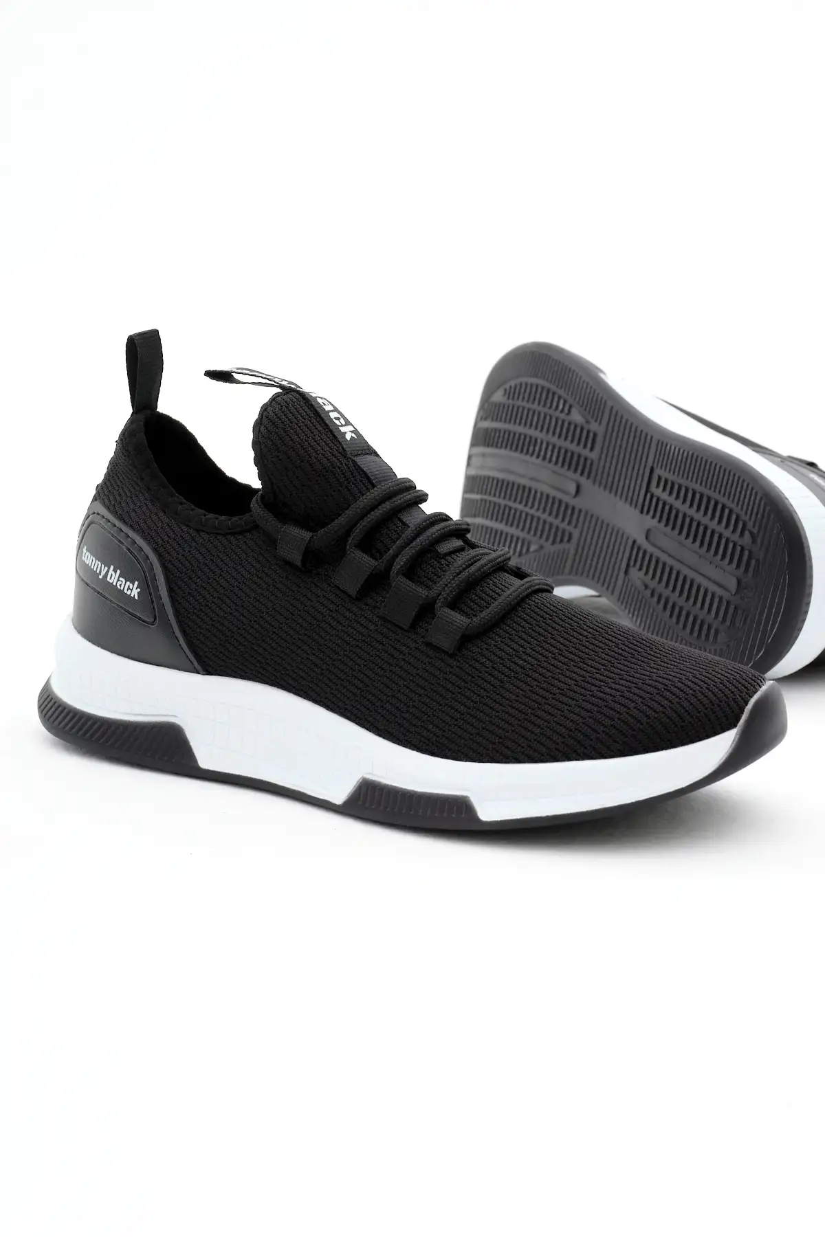 کفش کتانی زنانه  ورزشی بنددار با زیره پلی و پارچه تنفسی مشکی و سفید برای تمامی جنسیتها برند Tonny Black - 7725 کفش کتانی زنانه ورزشی بنددار با زیره پلی و پارچه تنفسی مشکی و سفید برای تمامی جنسیتها برند Tonny Black - 7725