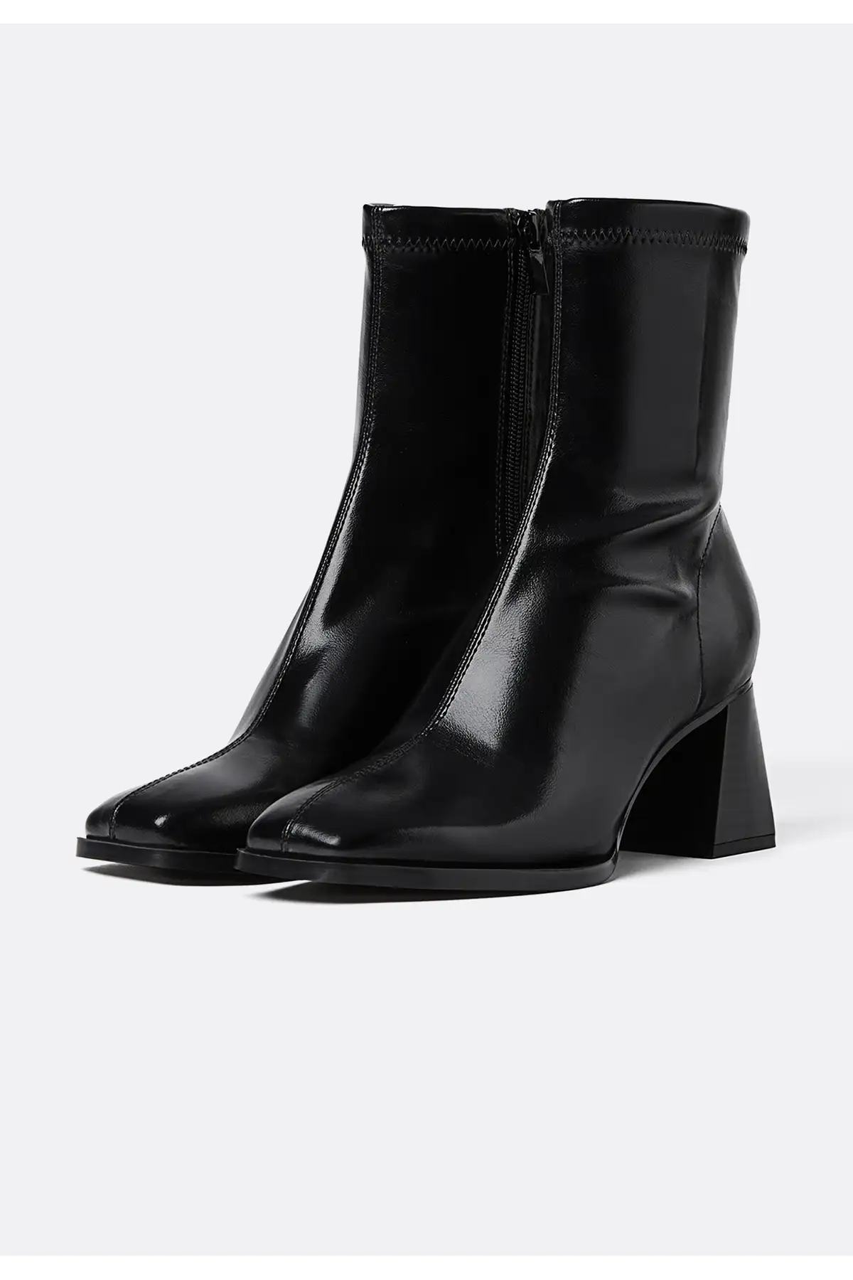 بوت و نیم بوت زنانه چکمه پاشنهبلند متسط با مچ کشی برند Stradivarius - 7555 بوت و نیم بوت زنانه چکمه پاشنهبلند متسط با مچ کشی برند Stradivarius - 7555