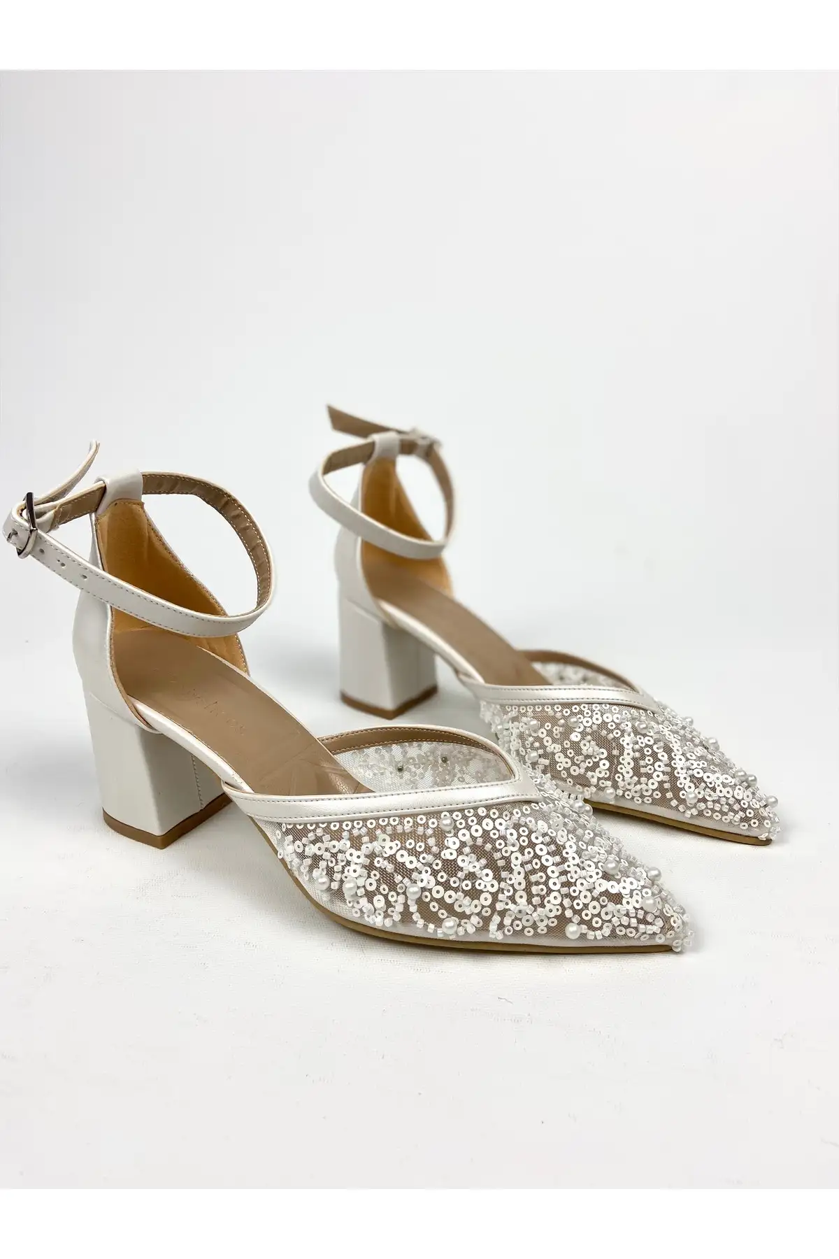 کفش پاشنه بلند زنانه  مجلسی پاشنه  با ضخامت 6 سانتیمتر و تزئین مرواریدهای رشتهای Sedef کد 01328 -  عروسی برند Gloriys Ayakkabı & Çanta - 7991 کفش پاشنه بلند زنانه مجلسی پاشنه با ضخامت 6 سانتیمتر و تزئین مرواریدهای رشتهای Sedef کد 01328 - عروسی برند Gloriys Ayakkabı & Çanta - 7991