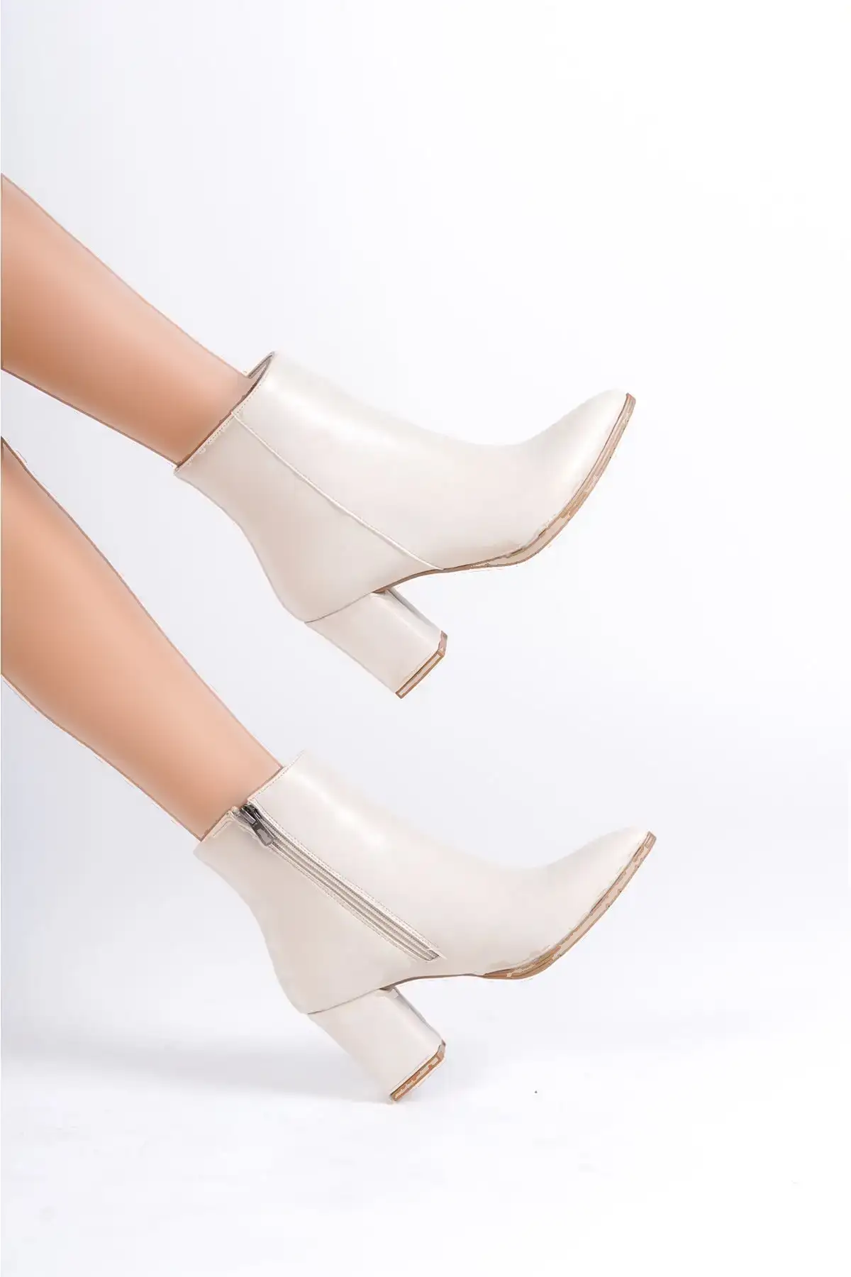 بوت و نیم‌ بوت زنانه کفی بیج مات چرم با زیپ پاشنه بلند کالی برند sefayol - 7565