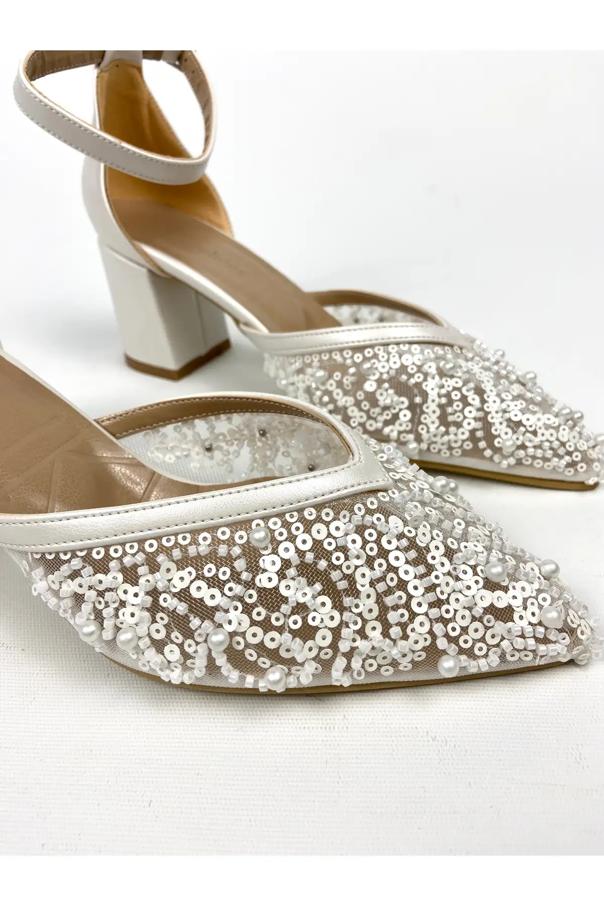 کفش پاشنه بلند زنانه  مجلسی پاشنه  با ضخامت 6 سانتیمتر و تزئین مرواریدهای رشتهای Sedef کد 01328 -  عروسی برند Gloriys Ayakkabı & Çanta - 7991 کفش پاشنه بلند زنانه مجلسی پاشنه با ضخامت 6 سانتیمتر و تزئین مرواریدهای رشتهای Sedef کد 01328 - عروسی برند Gloriys Ayakkabı & Çanta - 7991