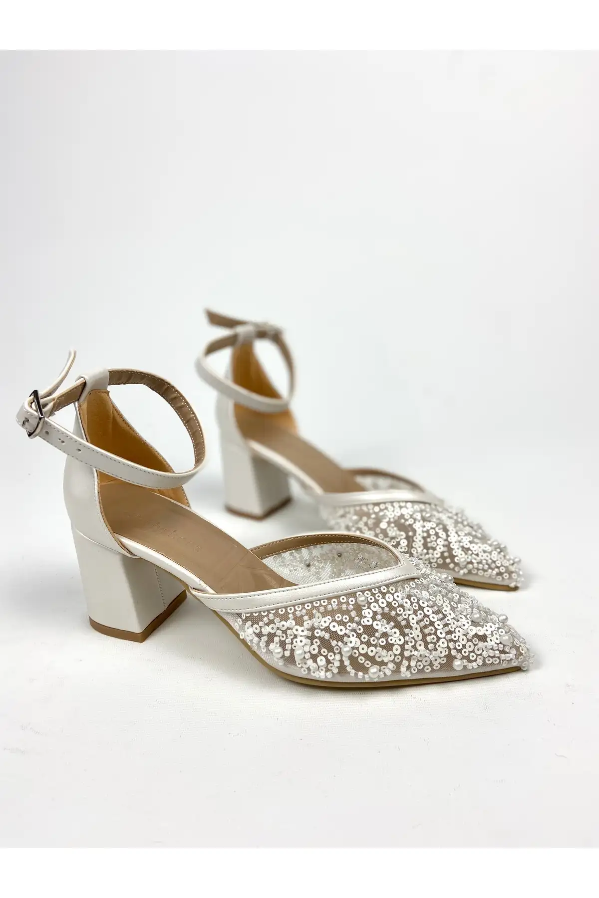 کفش پاشنه بلند زنانه  مجلسی پاشنه  با ضخامت 6 سانتیمتر و تزئین مرواریدهای رشتهای Sedef کد 01328 -  عروسی برند Gloriys Ayakkabı & Çanta - 7991 کفش پاشنه بلند زنانه مجلسی پاشنه با ضخامت 6 سانتیمتر و تزئین مرواریدهای رشتهای Sedef کد 01328 - عروسی برند Gloriys Ayakkabı & Çanta - 7991