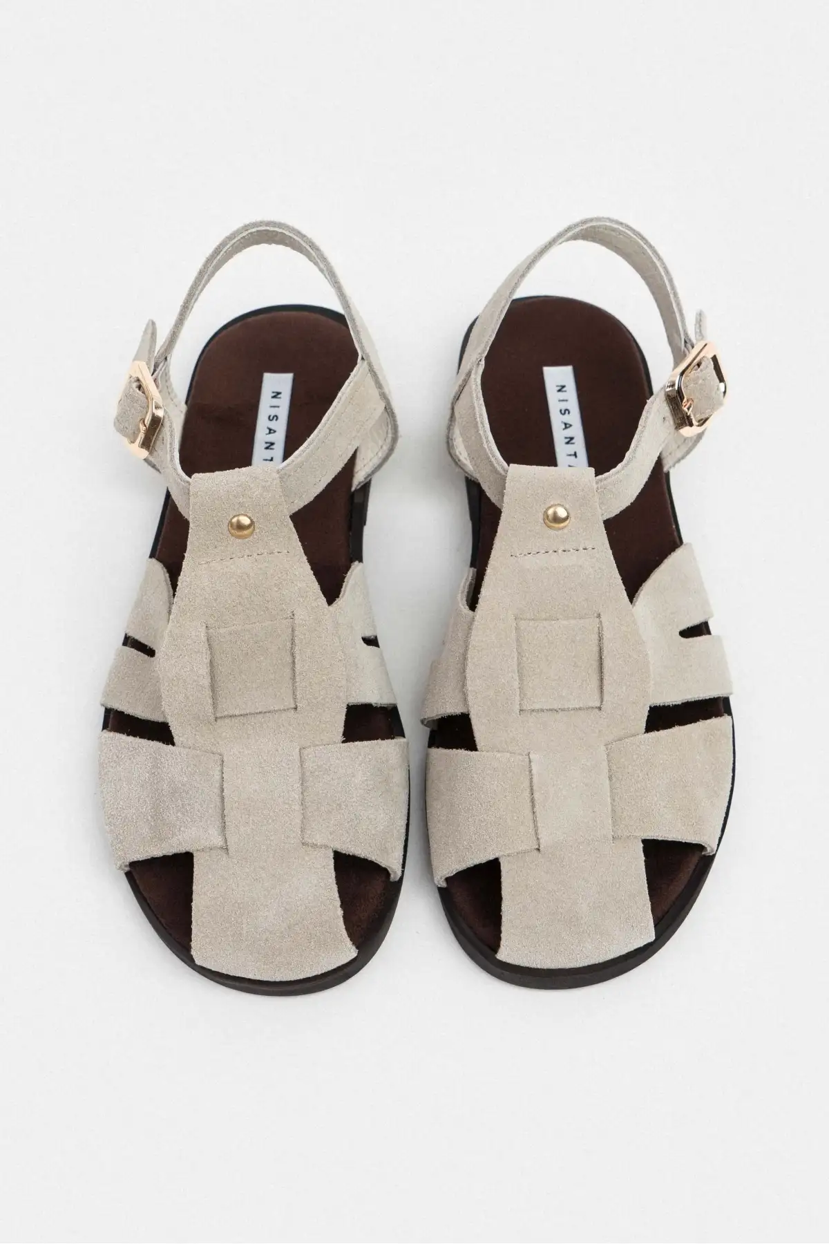 کفش صندل زنانه   ساده با کف تخت، چرم سوئد واقعی و جزئیات قفل دار به رنگ بژ برند NİŞANTAŞI SHOES - 8237 کفش صندل زنانه ساده با کف تخت، چرم سوئد واقعی و جزئیات قفل دار به رنگ بژ برند NİŞANTAŞI SHOES - 8237