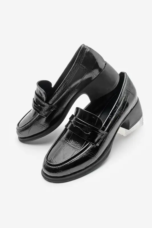 کفش لوفر زنانه روزمره پاشنهدار مد نوفیت مشکی برند Marjin - 8555 کفش لوفر زنانه روزمره پاشنهدار مد نوفیت مشکی برند Marjin - 8555